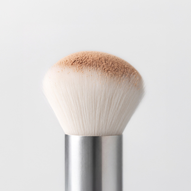 MÊME’s mini Kabuki Brush with synthetic bristles and aluminium handle.