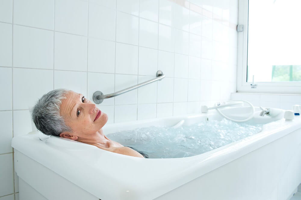 Bienfaits pour la peau du bain eau thermale Avène cure post cancer